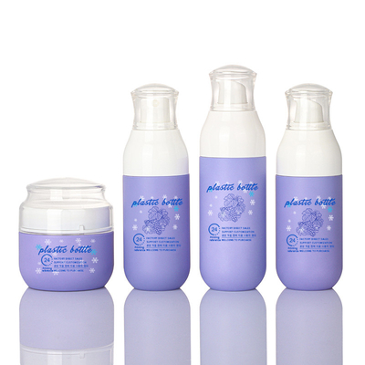 Ensembles cosmétiques en plastique de bouteille et de pots d'emballage de jet de soin de cheveux pourpres faits sur commande vides