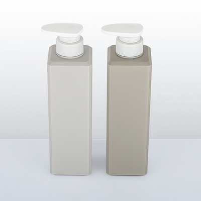 Bouteille cosmétique de lotion d'ANIMAL FAMILIER carré avec l'estampillage chaud de chapeau de pompe de presse