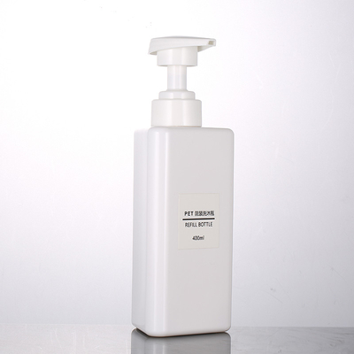 La forme en gros de triangle de 100ml 200ml 300ml réutilisent les bouteilles privées d'air de shampooing de la pompe 500ml d'animal familier de lotion de noir en plastique de conteneur